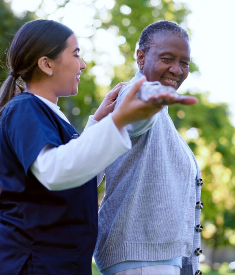 senior-woman-and-caregiver-with-arm-stretching-fo-2023-11-08-23-21-37-utc